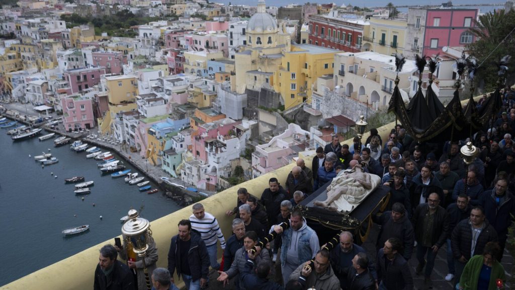 AP PHOTOS: People of all ages join in Holy Week processions on Italy’s Procida island