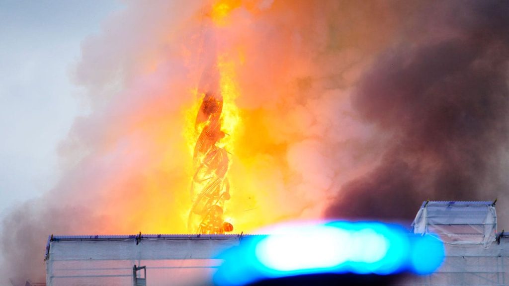 Famed spire on historic Old Stock Exchange in Denmark falls in fire