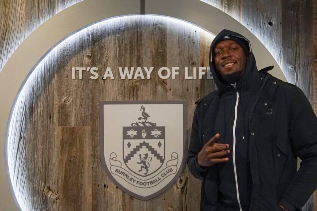 The Unlikely Trio: Usain Bolt, Burnley, and the Intriguing Story Behind a Bizarre Seasonal Photo