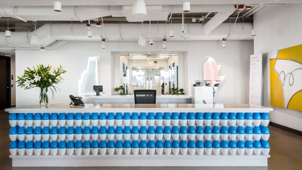 rewrite this title WeWork files motion to hold onto another co-working space in Seattle amid restructuring