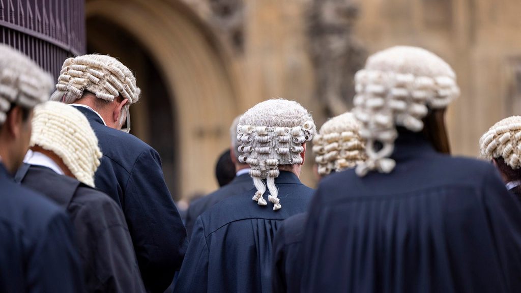 English courts are considering removing mandatory wigs for barristers due to concerns about cultural insensitivity.