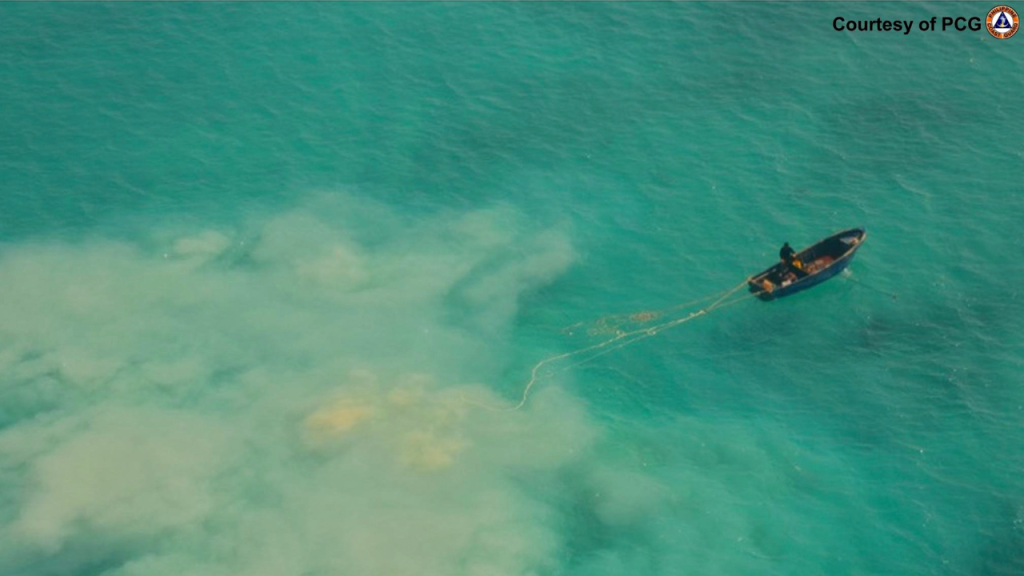 Philippines accuses China of looting giant clams in contested shoal