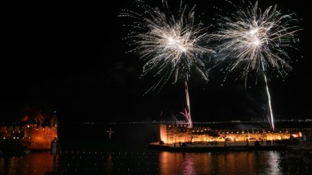 AP PHOTOS: Greek Orthodox observe Good Friday with somber bier processions