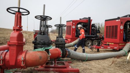 Rain and cooler temperatures contribute to halt growth of wildfire near Canada’s oil sands