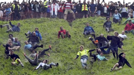 Competitors in the UK embrace quirky extreme races, from chasing cheese wheels to lugging sacks of wool