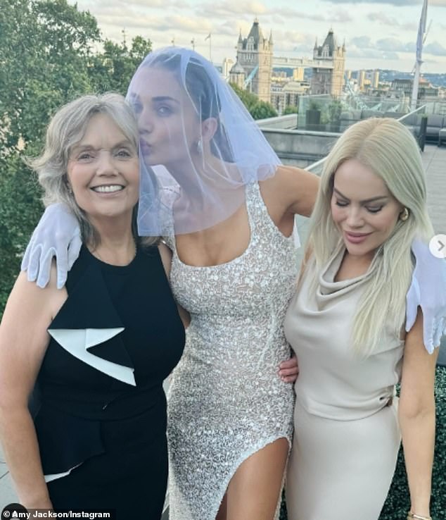 Amy Jackson shows off her stunning body in a sexy white bikini during her extravagant bachelorette party before tying the knot with fiancé Ed Westwick.