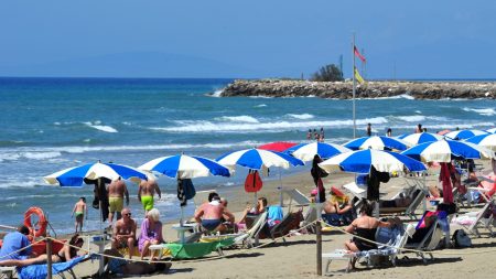 Italian beach establishments bring down umbrellas momentarily in protest over delays in liberalization plans
