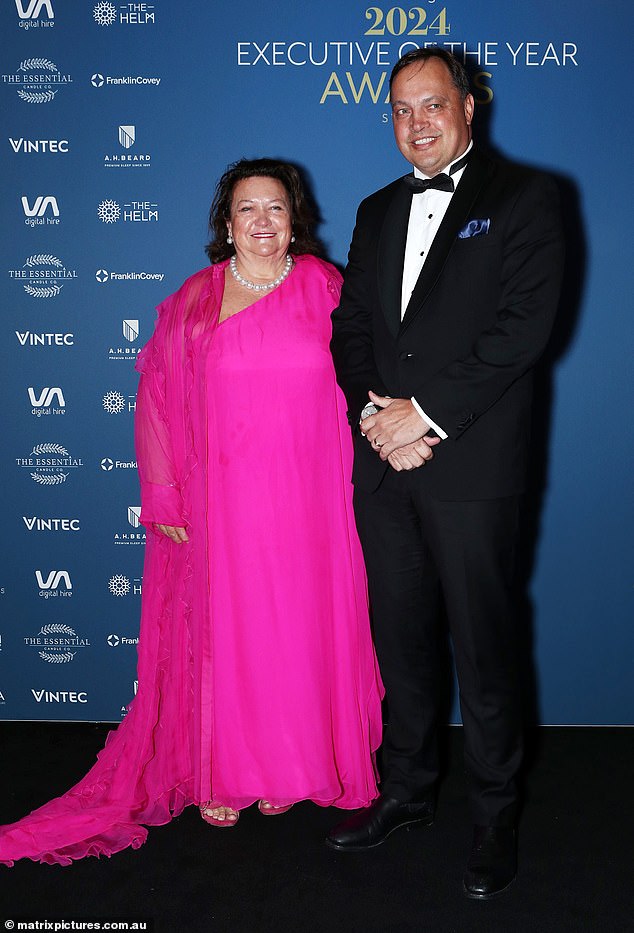 Gina Rinehart steals the spotlight in a breathtaking fuchsia gown at the 2024 Executive of the Year Awards in Sydney.