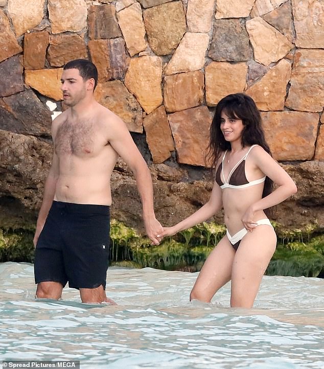 Camila Cabello reveals romance with mystery billionaire in steamy ocean kiss session