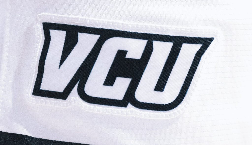rewrite this title VCU-Saint Lous men’s basketball game delayed by massive brawl in stands