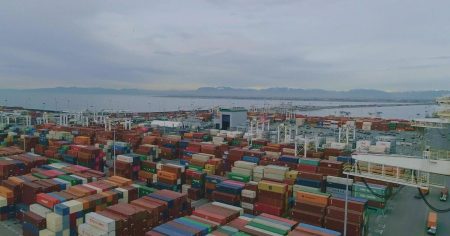 rewrite this title President Trump hits Canada, Mexico and China with tariffs and warns Europe