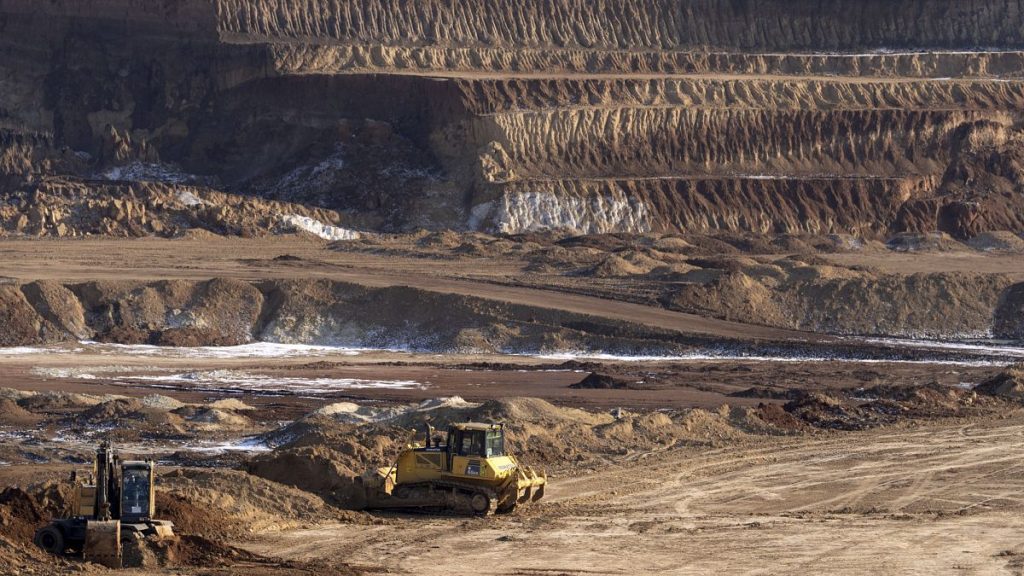 rewrite this title Ukraine and US agree on minerals deal, Ukrainian officials say
