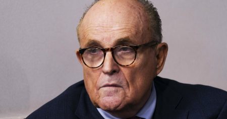 rewrite this title Rudy Giuliani satisfies judgment in defamation case brought by former Georgia election workers