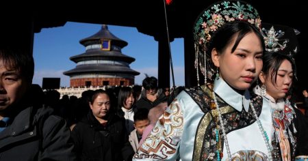 rewrite this title Year of the Snake comes with a bite for Chinese consumers facing an economic slowdown