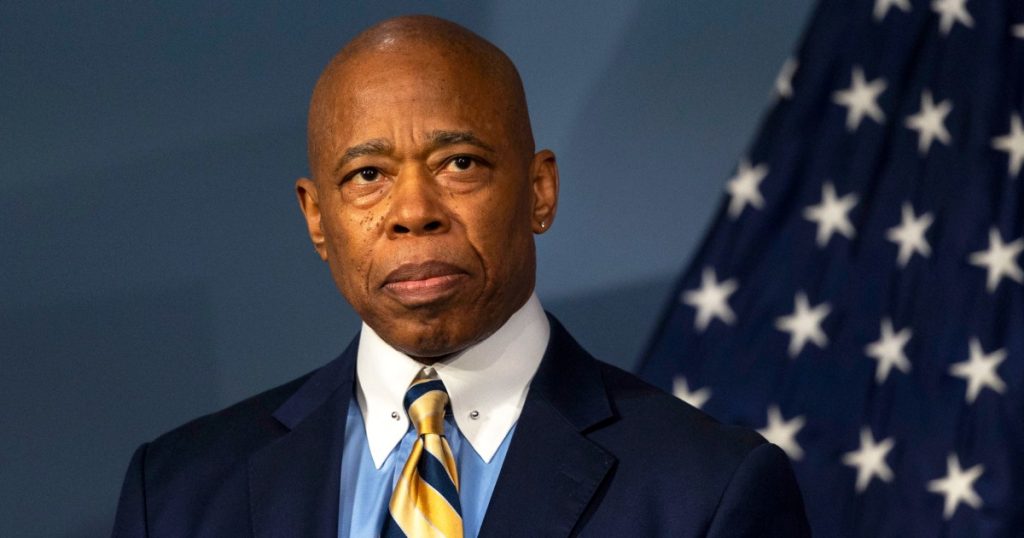 rewrite this title Justice Department moves to dismiss Eric Adams case after extraordinary internal revolt