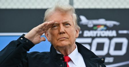 rewrite this title Trump attends the Daytona 500 and says the spirit of NASCAR will ‘fuel America’s Golden Age’