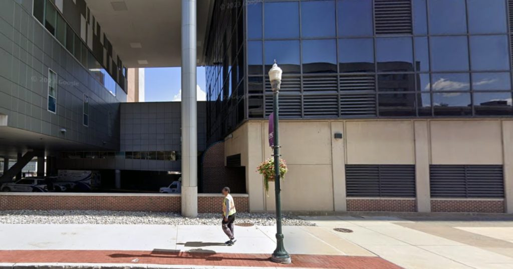 rewrite this title Police officer killed in Pennsylvania hospital shooting