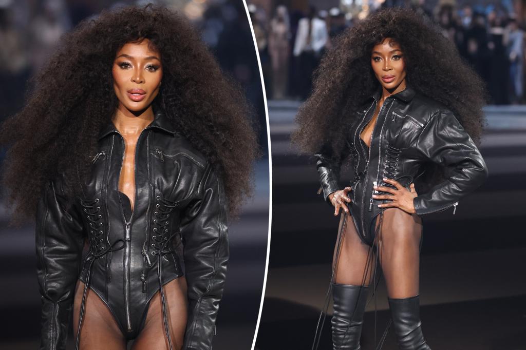 rewrite this title
Naomi Campbell looks incredible in lace-up leather bodysuit on star-studded Dsquared2 runway