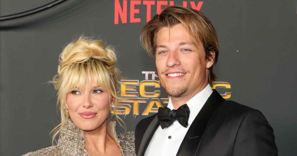 rewrite this title Millie Bobby Brown and Jake Bongiovi Bring the Glam to ‘The Electric State’ Premiere