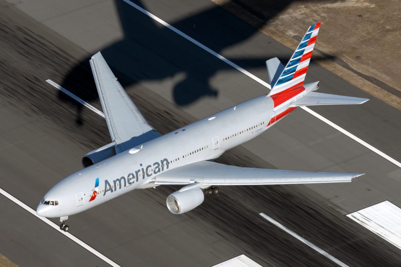 rewrite this title American Airlines Adds U.S. Muscle to Heathrow Reform Campaign