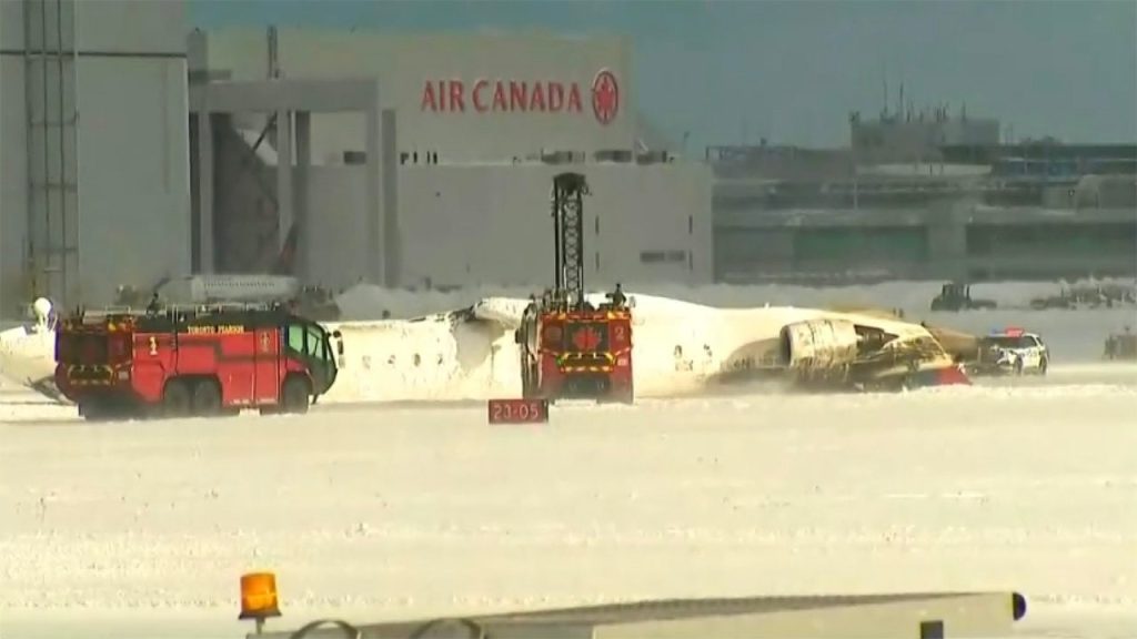 rewrite this title Delta crash reported at Canada's Toronto Pearson Airport; crews responding to plane flipped upside down