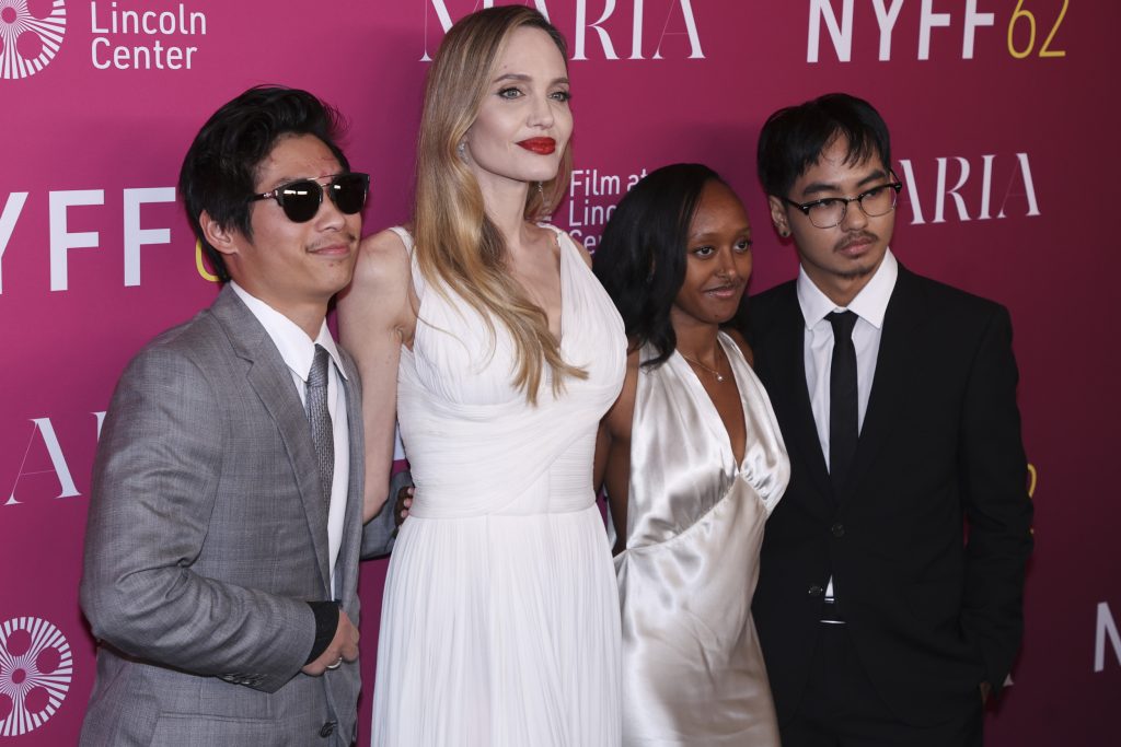 rewrite this title Angelina Jolie’s Son Pax Debuts New Family Member