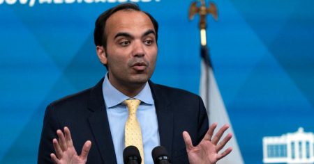 rewrite this title Trump fires Rohit Chopra, director of the Consumer Financial Protection Bureau