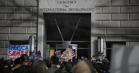 rewrite this title USAID to put nearly all staff on leave Friday; overseas missions shuttering
