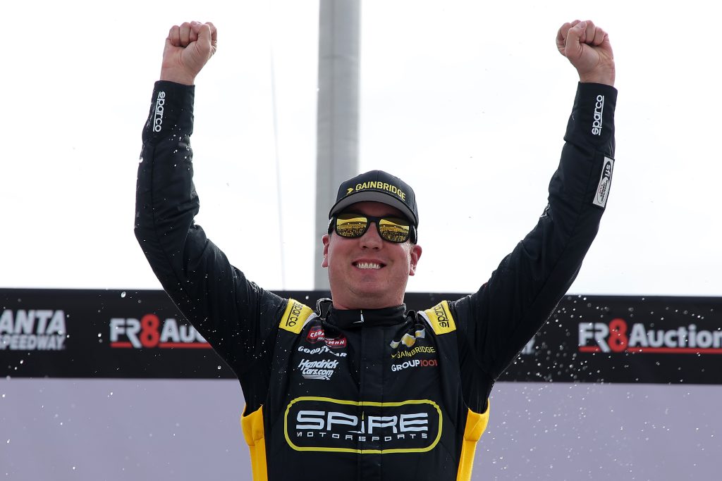 rewrite this title Kyle Busch Collects Another NASCAR Trophy In Atlanta