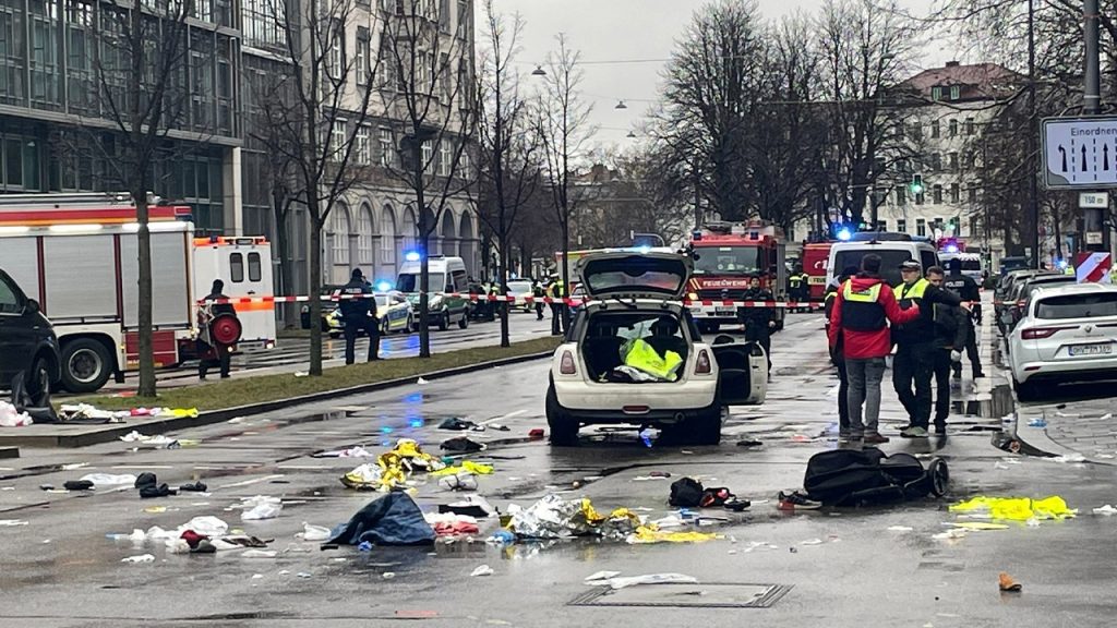 rewrite this title Car driver in Munich plows into crowd 1 day before Vance and world leaders gather for security conference