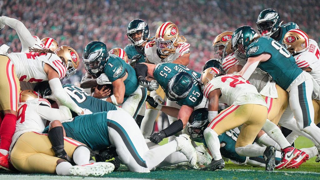 rewrite this title NFC team submits proposal to ban Eagles' famous 'Tush Push' play: report