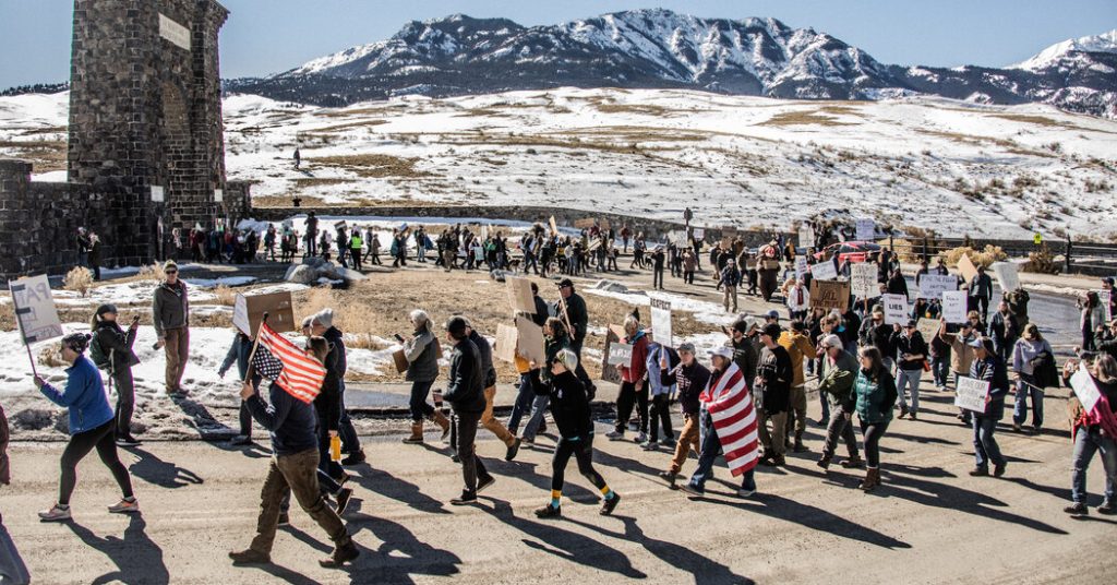 rewrite this title Hundreds Gather at National Parks Across U.S. to Protest Job Cuts