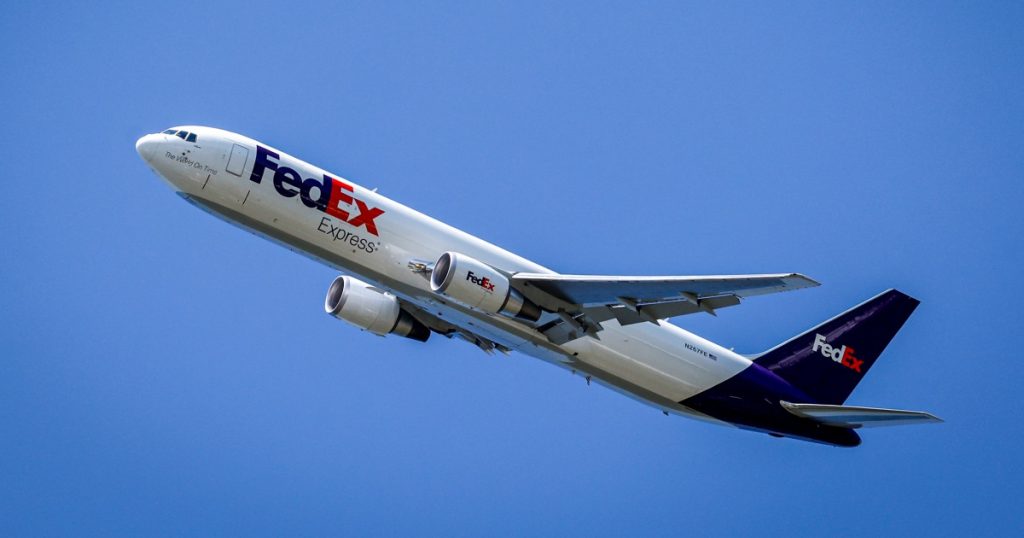 rewrite this title FedEx flight catches fire after colliding with bird during takeoff from Newark airport