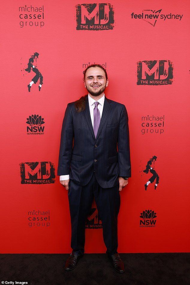 rewrite this title Michael Jackson’s son Prince cuts a dapper figure as he makes rare appearance at opening night of MJ The Musical in Sydney