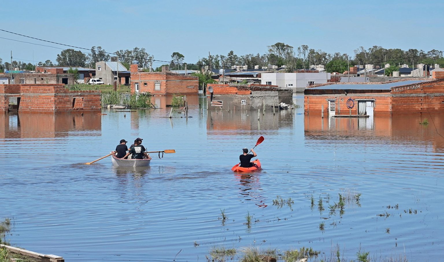 rewrite this title Dozens killed and missing after flash floods in Argentina