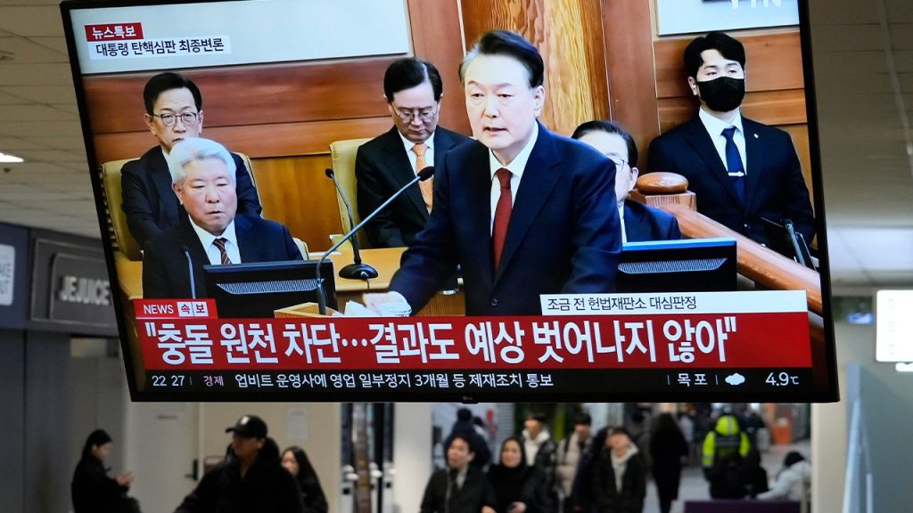 rewrite this title Court orders South Korean President Yoon freed from jail for martial law trial