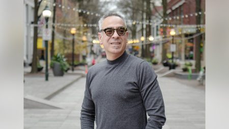 rewrite this title Taliban frees American hostage George Glezmann following negotiations with US, Qatar