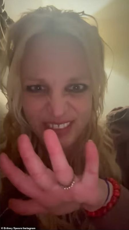 rewrite this title Britney Spears fans left ‘frightened’ and alarmed by new video of her with chipped nails and messy hair